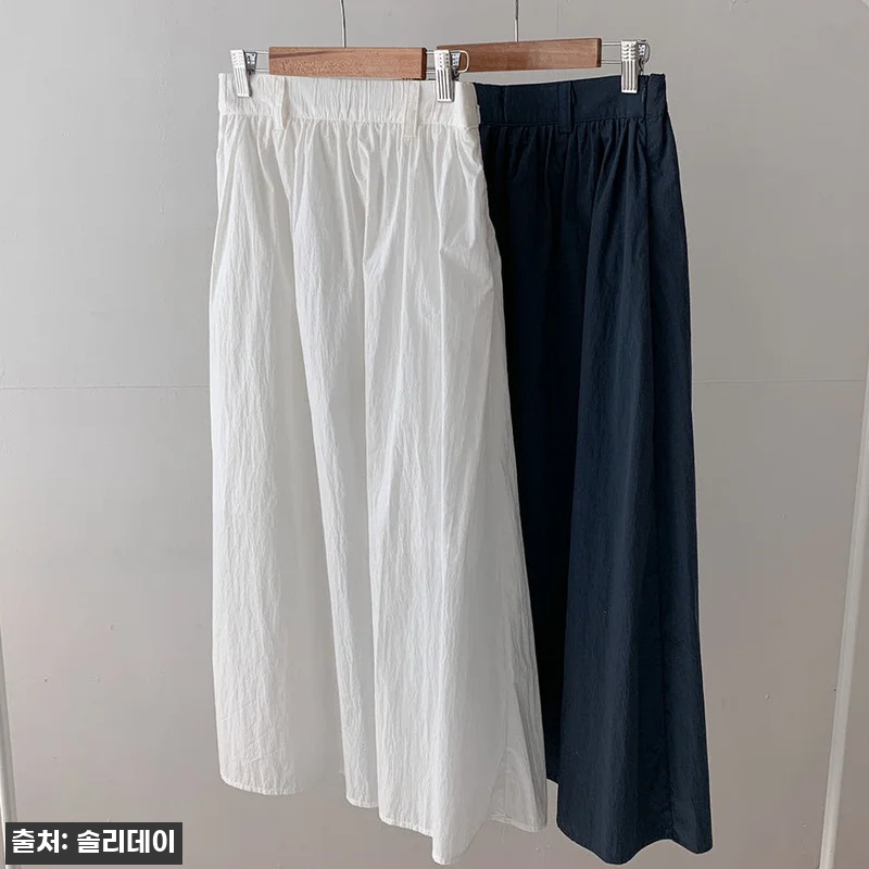 솔리데이 나일론스커트 바스락 플레어 화이트 롱 스커트, 아이보리 데일리룩으로 눈여겨볼 이슈템 10 솔리데이 나일론스커트 바스락 플레어 관련 이미지 1